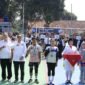 Pembukaan O2SN Kabupaten Tangerang 2025 di Lapangan SMAN 8, diikuti ratusan pelajar penuh semangat. (Foto: Dok. Pemkab Tangerang)