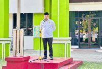 Kepala Kantor Kemenag Kabupaten Tangerang, H. A. Baijuri, saat memberikan amanat sebagai pembina apel usai musim haji 2025.(Foto: Humas Kemenag Tangerang)